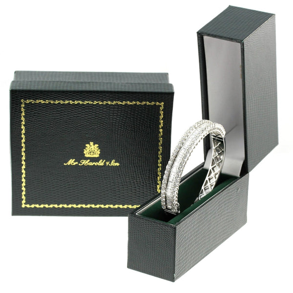 18ct white gold 2.71ct baguette & round diamond twist bangle