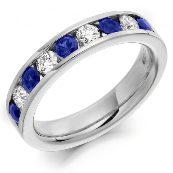 Platinum 0.65ct sapphire & 0.46ct diamond half eternity ring