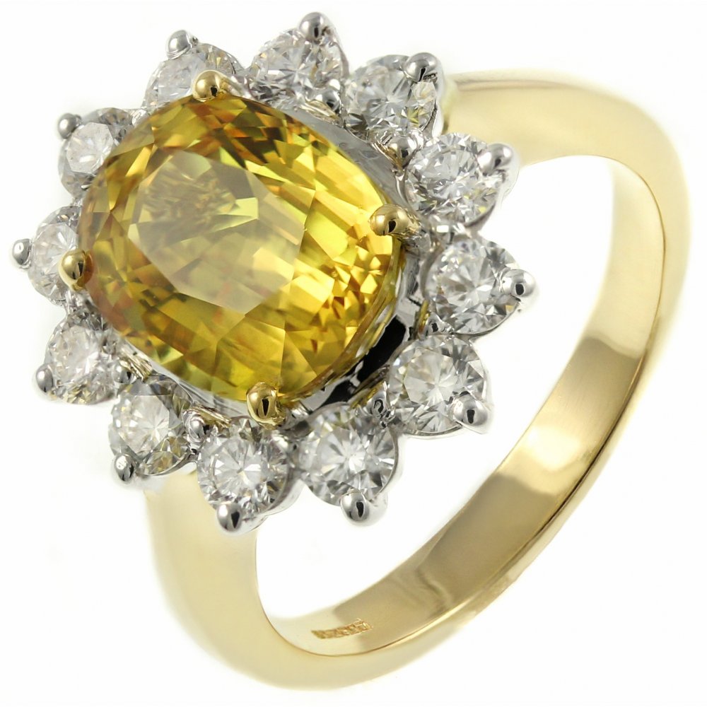 18ct yellow gold 4.05ct yellow sapphire & 1.10ct diamond ring