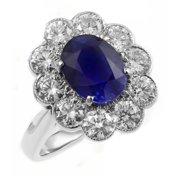 Platinum 2.95ct sapphire & 1.65ct diamond oval cluster ring