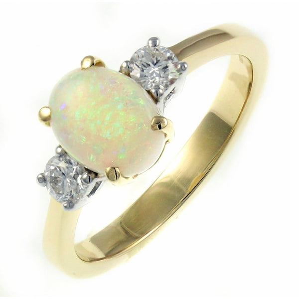 18ct yellow gold 0.36ct natural opal & 0.29ct diamond ring