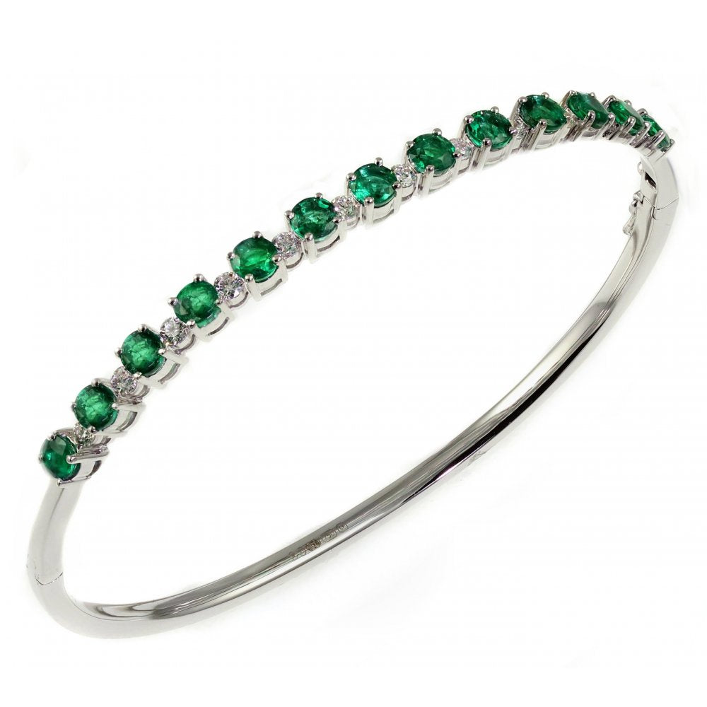 18ct white gold 2.18ct emerald & 0.48ct diamond bangle