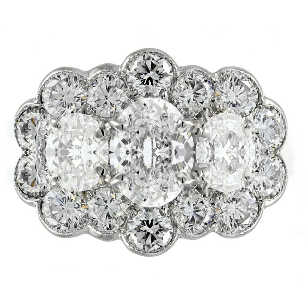 Platinum 1.85ct oval & 1.40ct round diamond cluster ring
