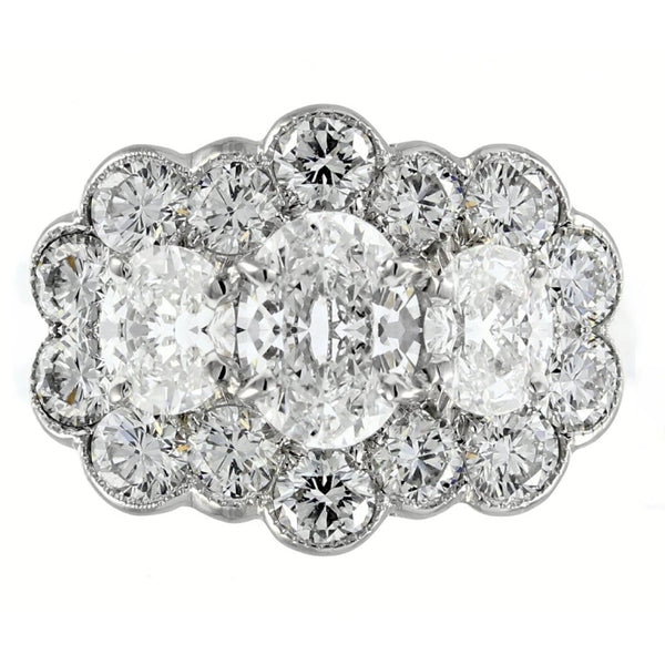 Platinum 1.85ct oval & 1.40ct round diamond cluster ring