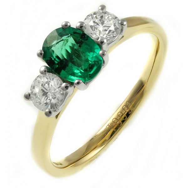 18ct yellow gold 1.24ct emerald & 0.50ct 3 stone diamond ring