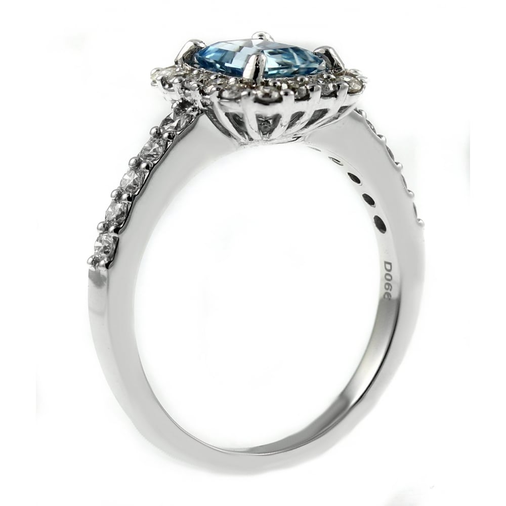 18ct white gold 0.97ct aquamarine & 0.49ct diamond cluster ring