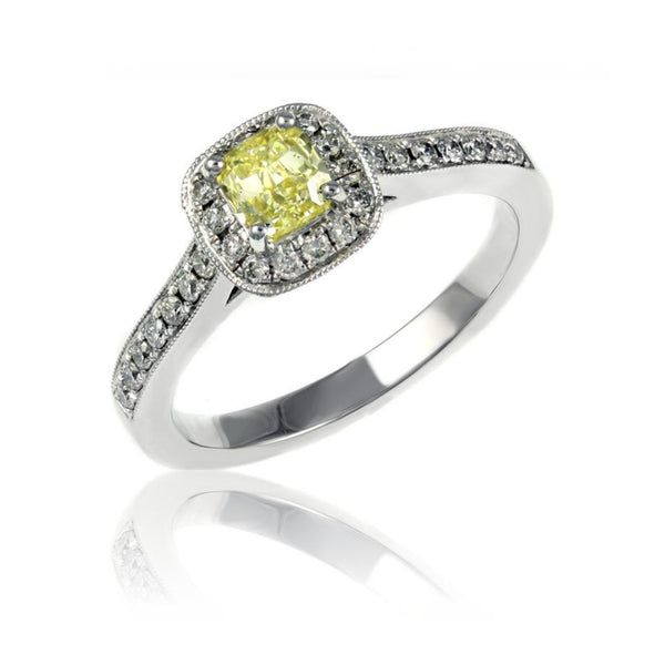Platinum 0.51ct fancy yellow VVS2 GIA diamond halo ring