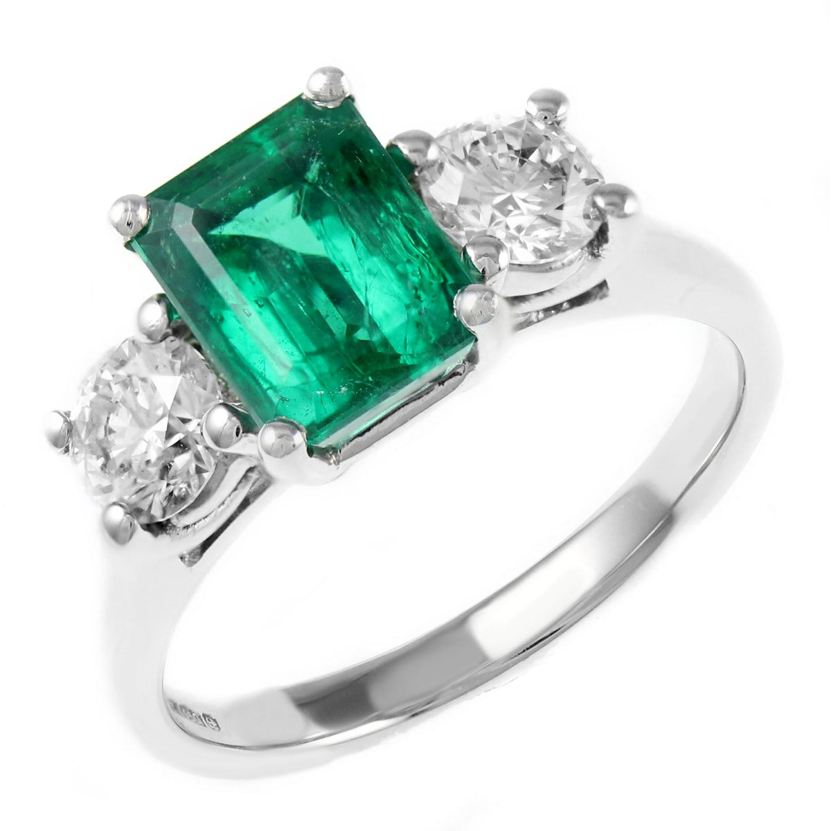 Platinum 1.58ct emerald & 1.00ct 3 stone diamond ring