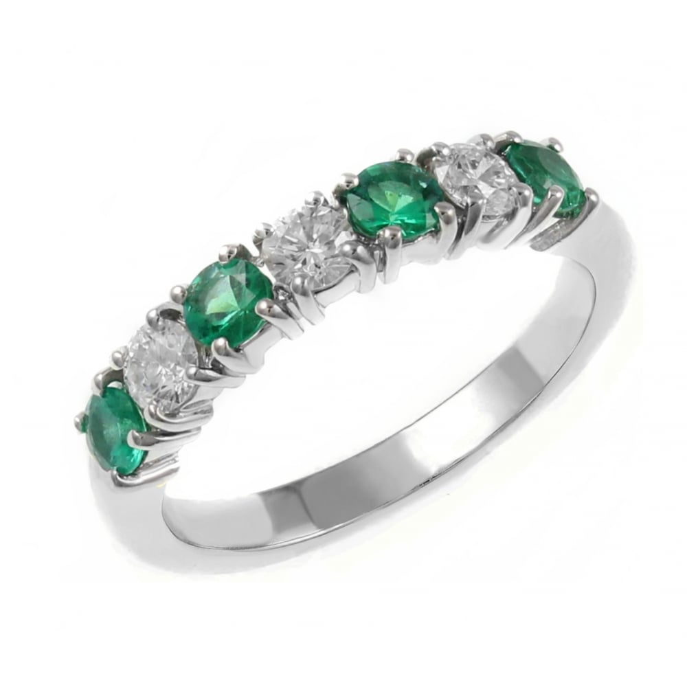 Platinum 0.58ct emerald & 0.45ct diamond 7 stone ring