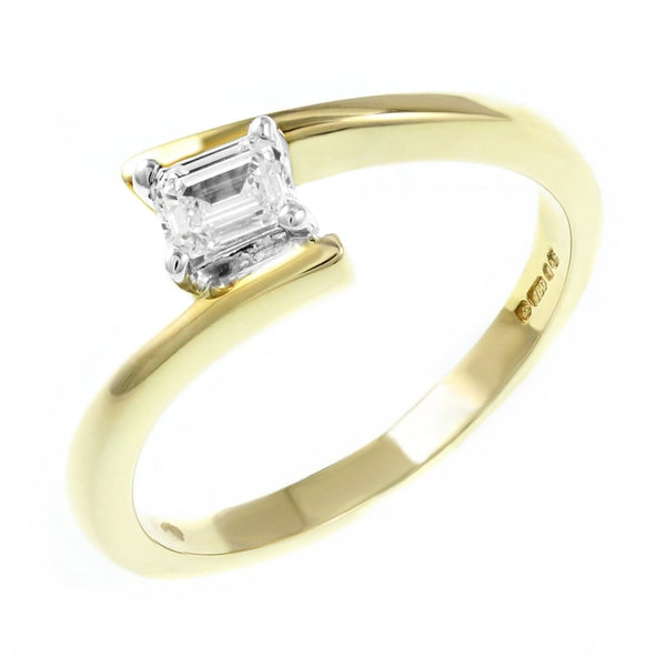 18ct yellow gold 0.25ct emerald cut diamond twist ring