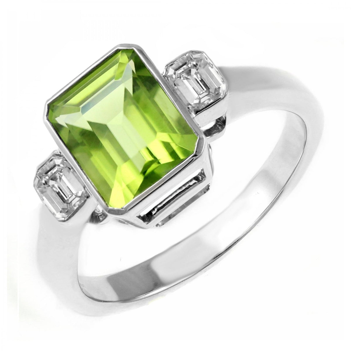 Platinum 2.54ct peridot & 0.40ct diamond 3 stone ring