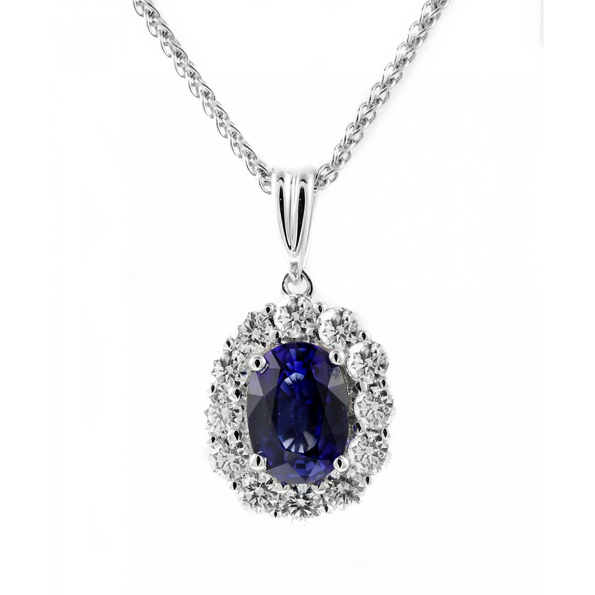 Platinum 0.58ct Sapphire & 0.12ct Diamond Cluster Pendant