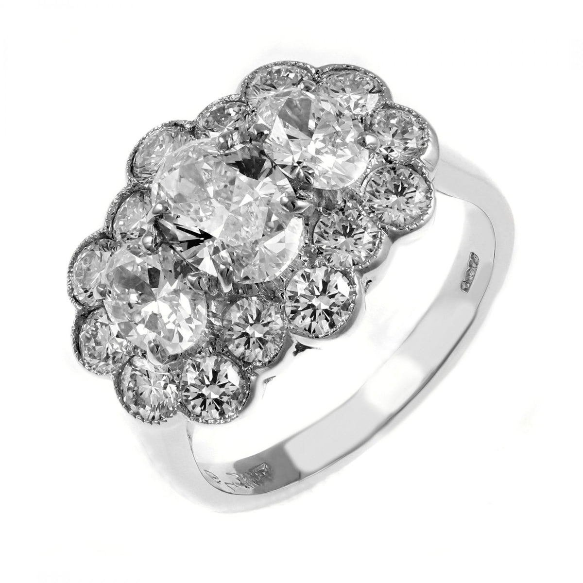 Platinum 1.85ct oval & 1.40ct round diamond cluster ring