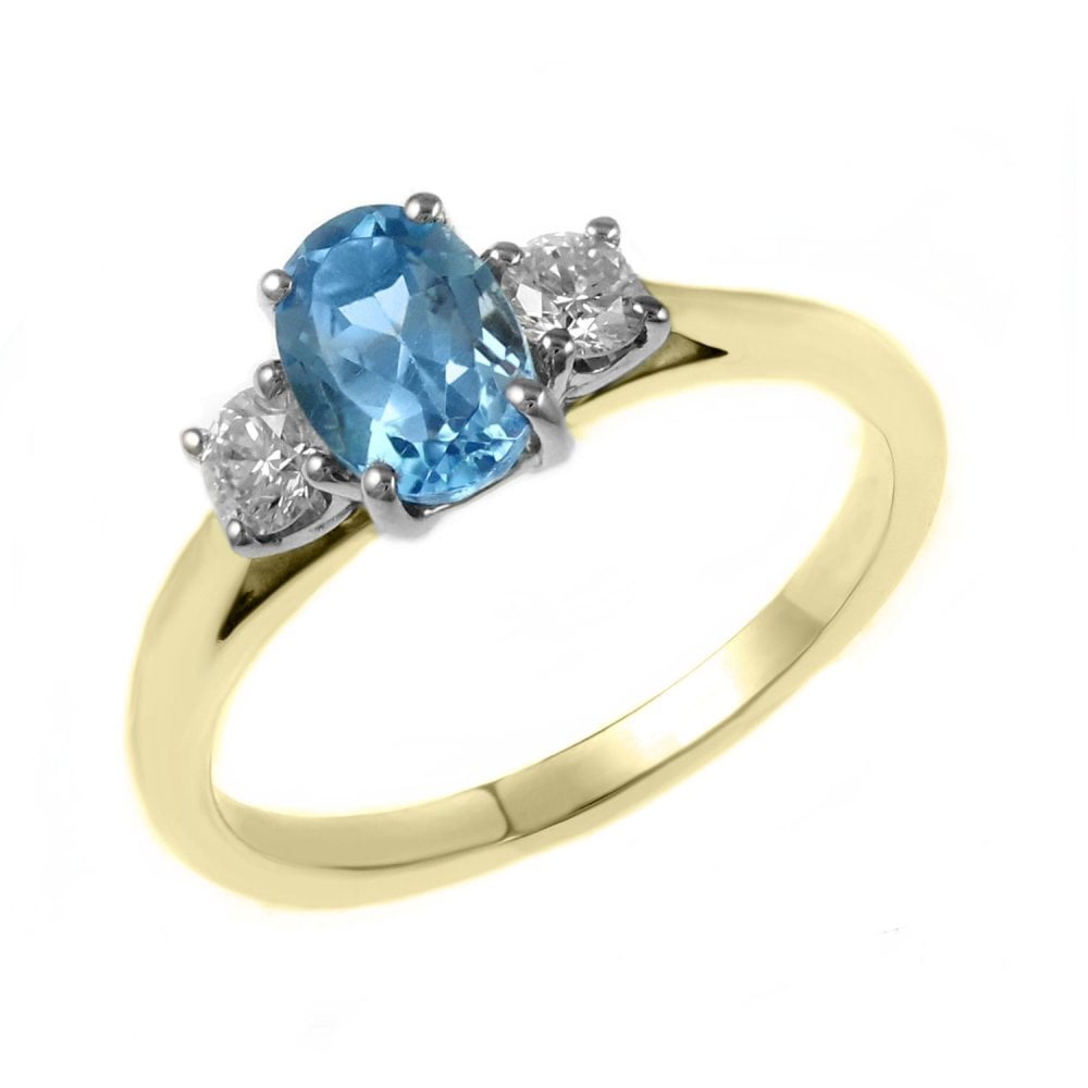 18ct yellow gold 0.90ct blue topaz & 0.26ct diamond 3 stone ring