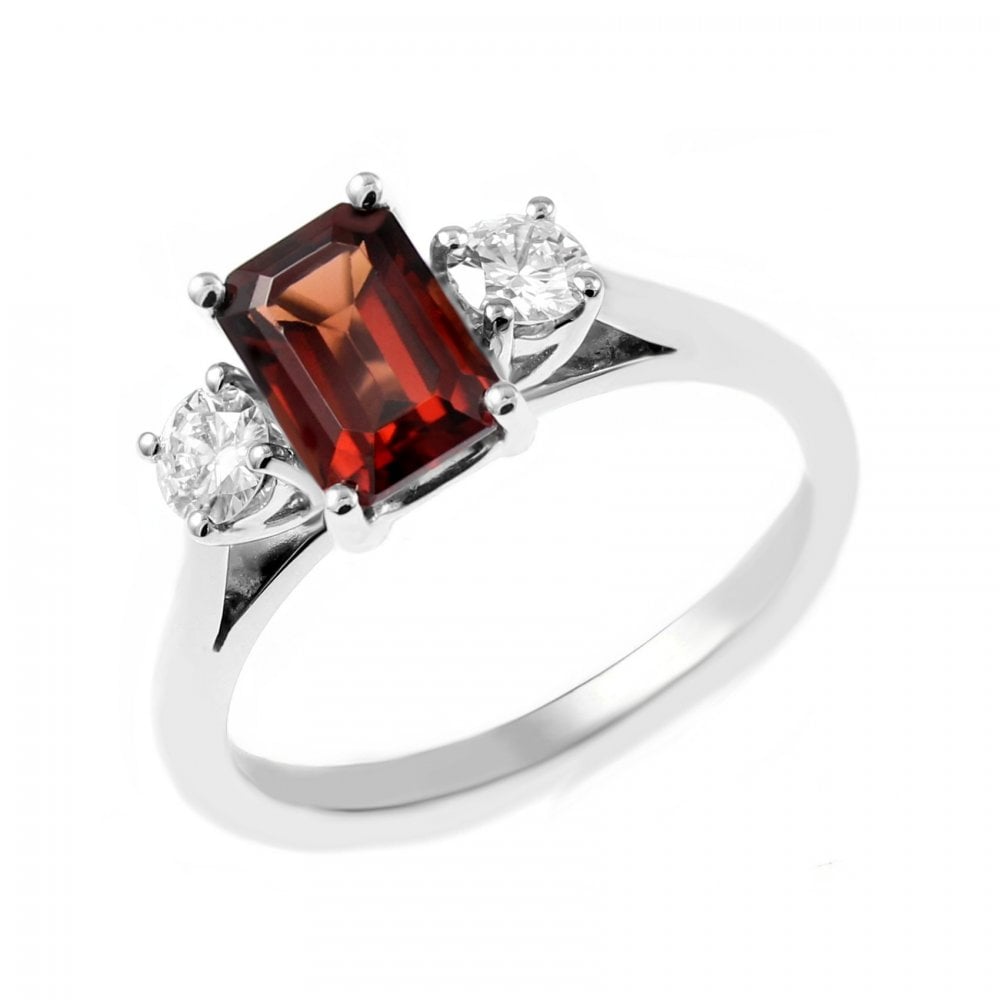 Platinum 1.12ct garnet & 0.30ct diamond 3 stone ring