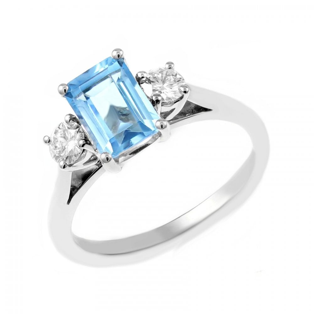 Platinum 1.19ct blue topaz & 0.30ct diamond 3 stone ring