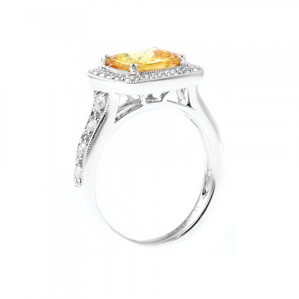 18ct white gold 2.41ct yellow sapphire & 0.59ct diamond ring