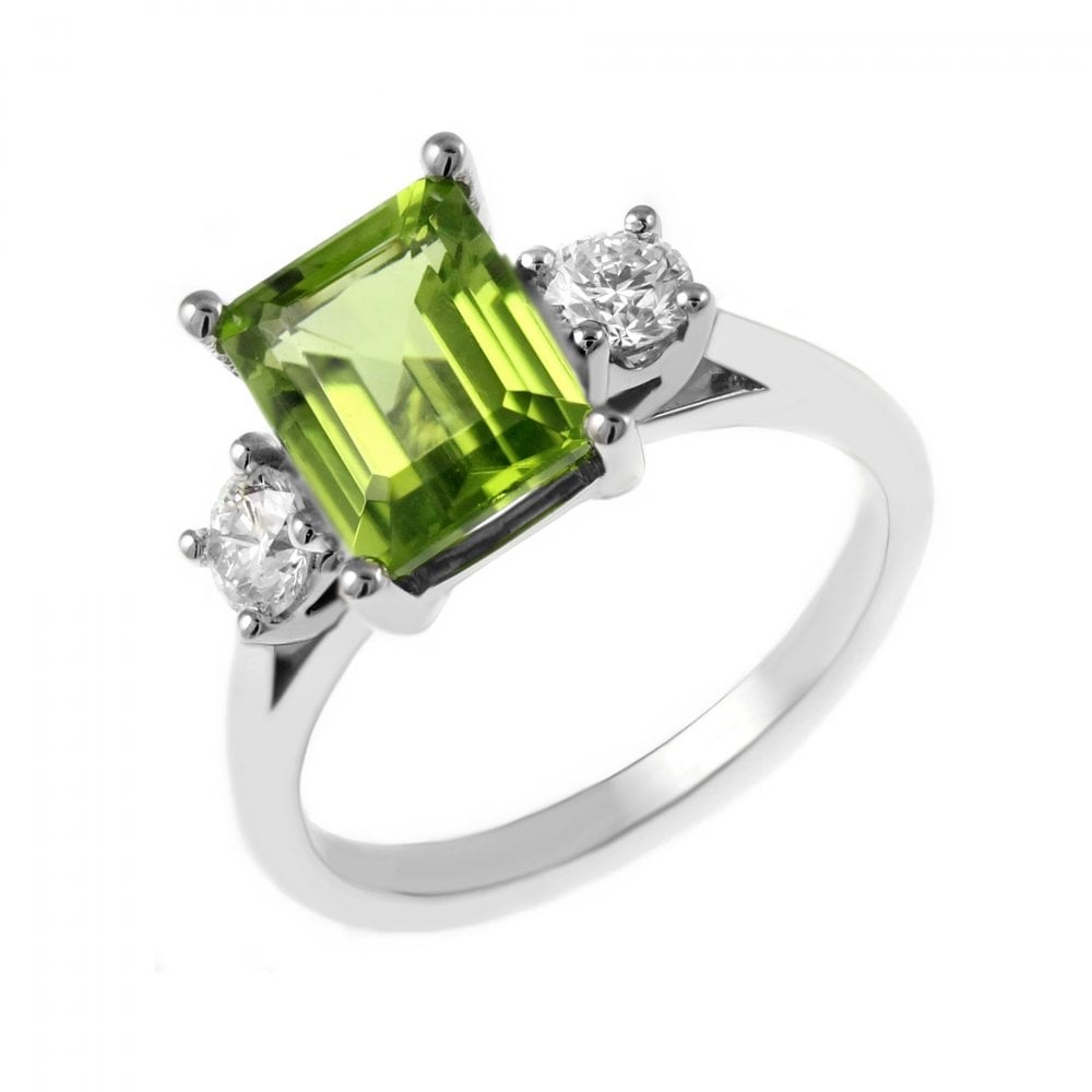 Platinum 2.35ct peridot & 0.41ct diamond 3 stone ring