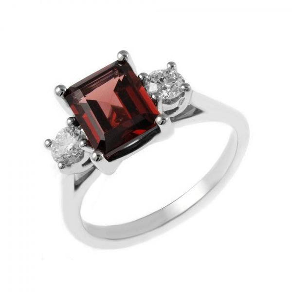 Platinum 2.86ct garnet & 0.40ct diamond 3 stone ring