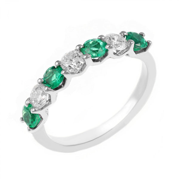 Platinum 0.65ct emerald & 0.45ct diamond 7 stone ring
