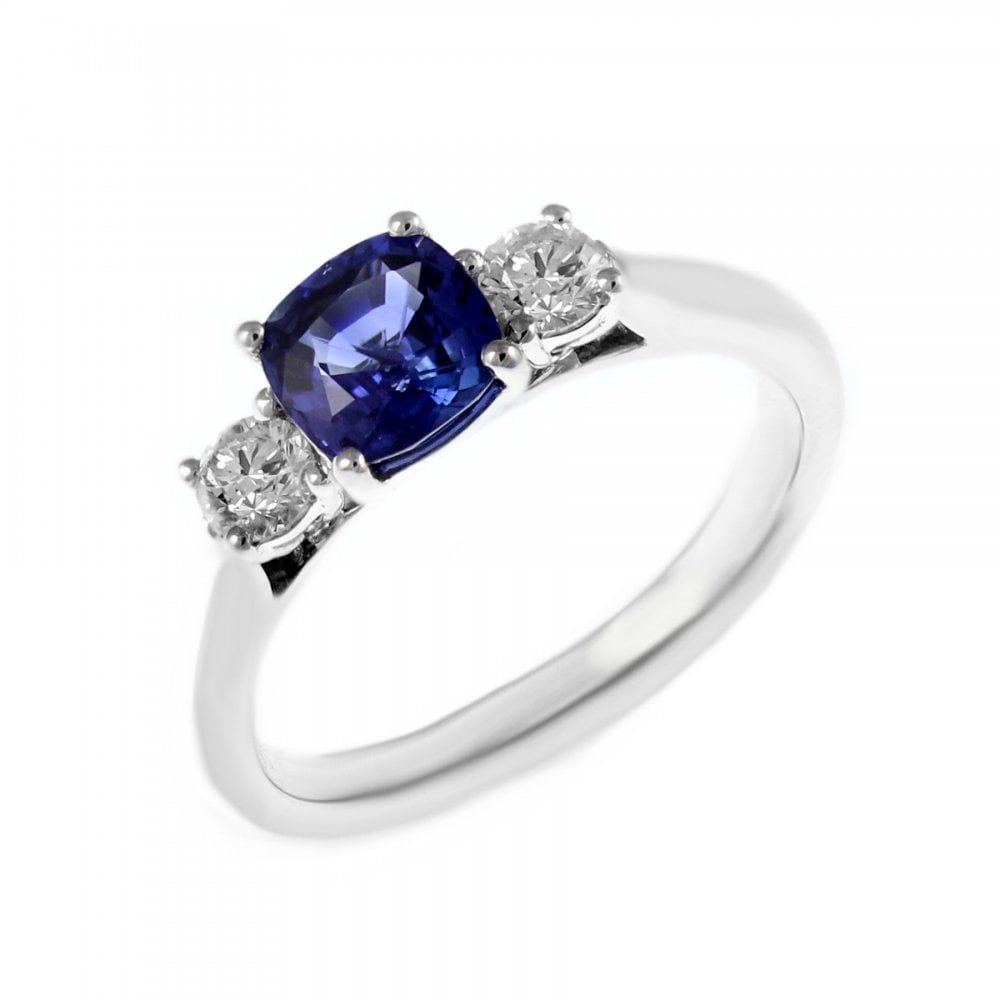 Platinum 0.91ct sapphire & 0.31ct diamond 3 stone ring