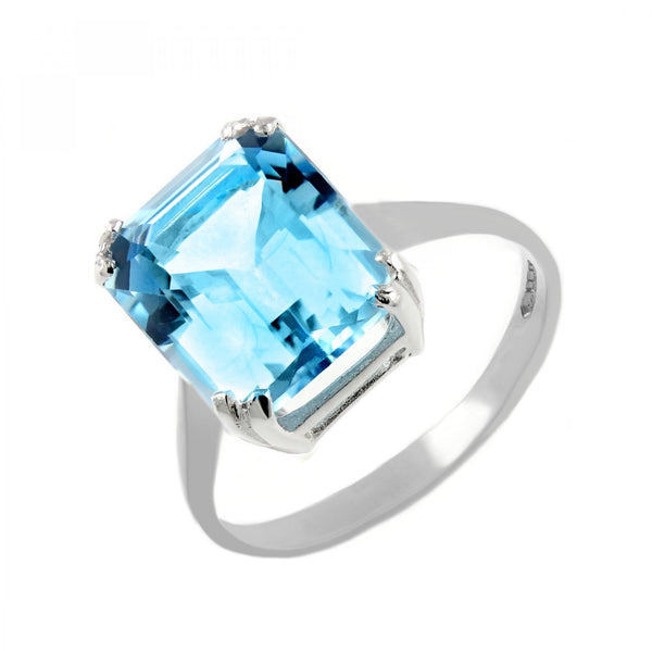 Platinum 12mm x 10mm emerald cut Swiss blue topaz ring