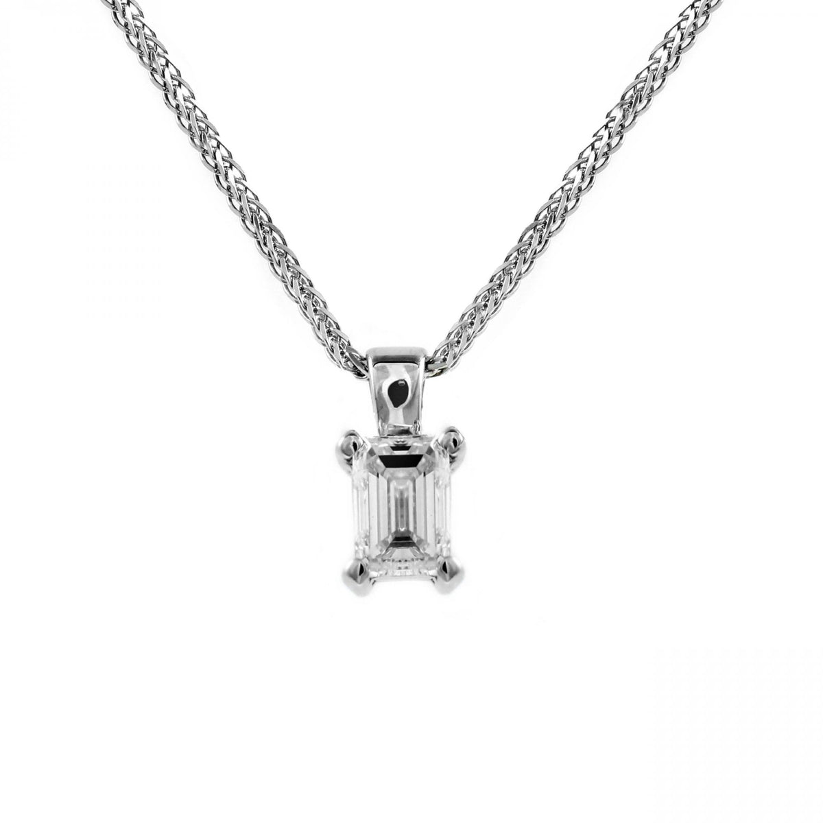 Platinum 0.70ct F VS2 GIA emerald cut diamond pendant