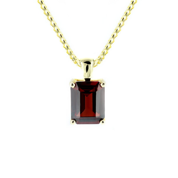 9ct yellow gold 8x6mm emerald cut garnet pendant