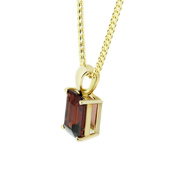 9ct yellow gold 8x6mm emerald cut garnet pendant