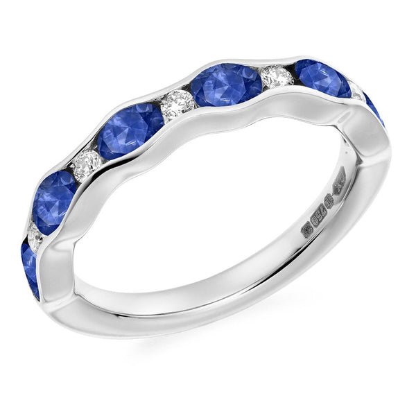Platinum 1.25ct sapphire & 0.15ct diamond eternity ring