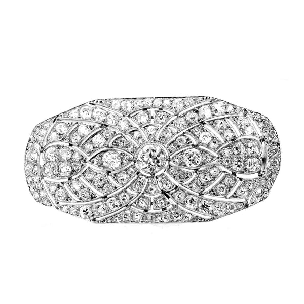 Preowned platinum 5.50ct old cut oval shaped diamond brooch