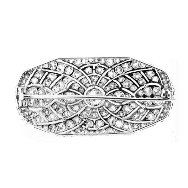 Preowned platinum 5.50ct old cut oval shaped diamond brooch