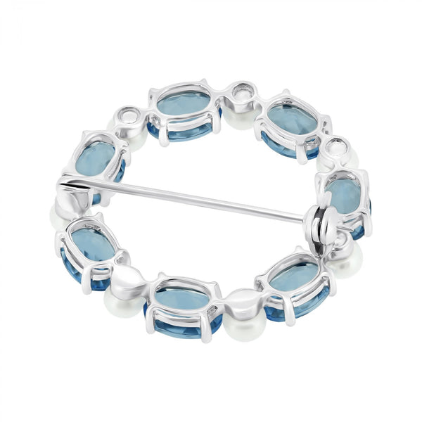 9ct white gold oval 7x5mm London blue topaz & round pearl brooch
