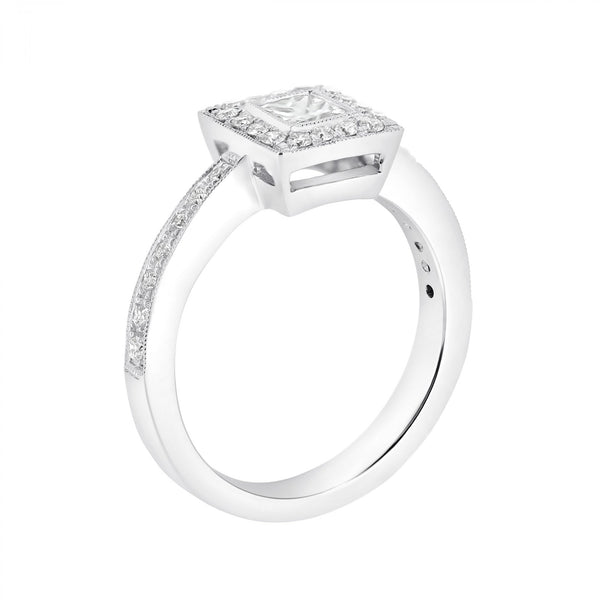 Platinum 0.33ct princess & 0.26ct round diamond halo ring