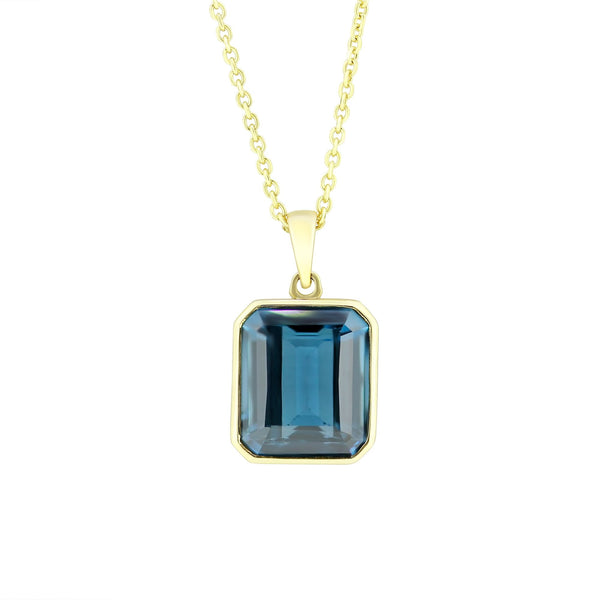 9ct yellow gold 7.60ct London blue topaz emerald cut pendant