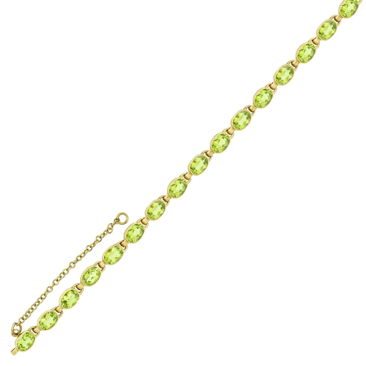 9ct yellow gold 7x5mm oval peridot rubover bracelet