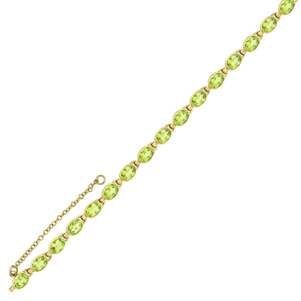 9ct yellow gold 7x5mm oval peridot rubover bracelet
