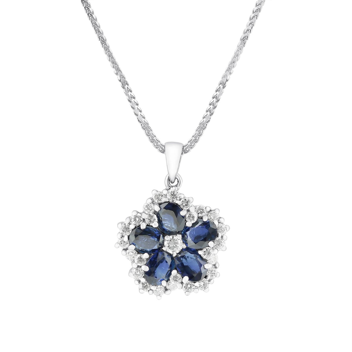 18ct white gold 2.20ct flower sapphire & 0.54ct diamond pendant