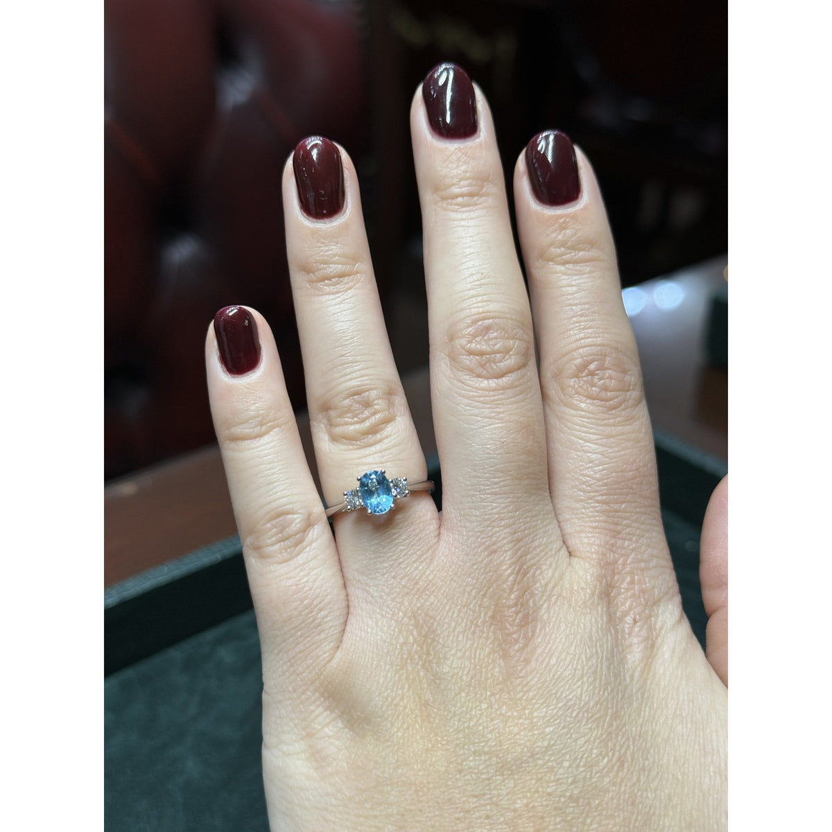 Platinum 0.93ct blue topaz & 0.25ct diamond 3 stone ring