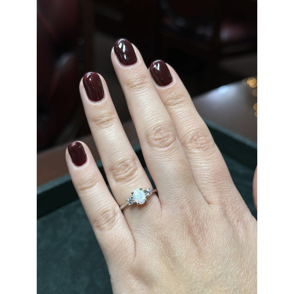 Platinum 0.46ct opal & 0.25ct diamond 3 stone ring