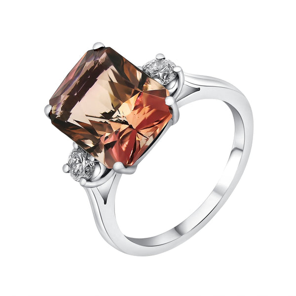 Platinum 6.62ct peach tourmaline & 0.41ct diamond 3 stone ring
