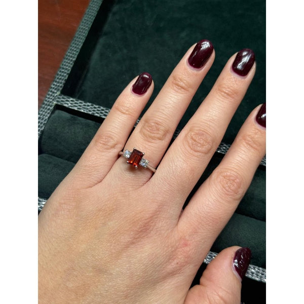 Platinum 1.29ct orange sapphire & 0.30ct diamond 3 stone ring