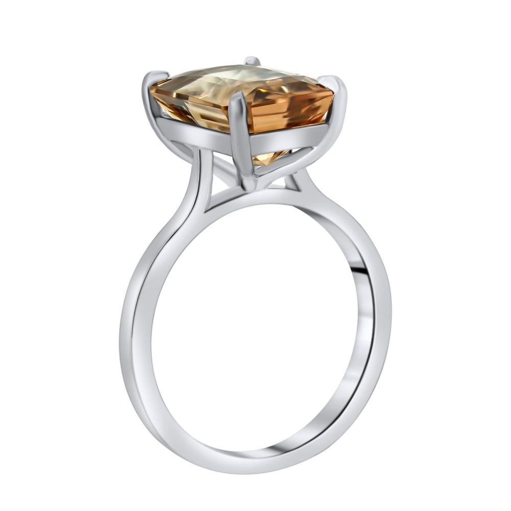 Platinum 5.80ct emerald cut orange tourmaline ring