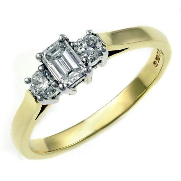 18ct yellow gold 0.56ct emerald & round diamond 3 stone ring