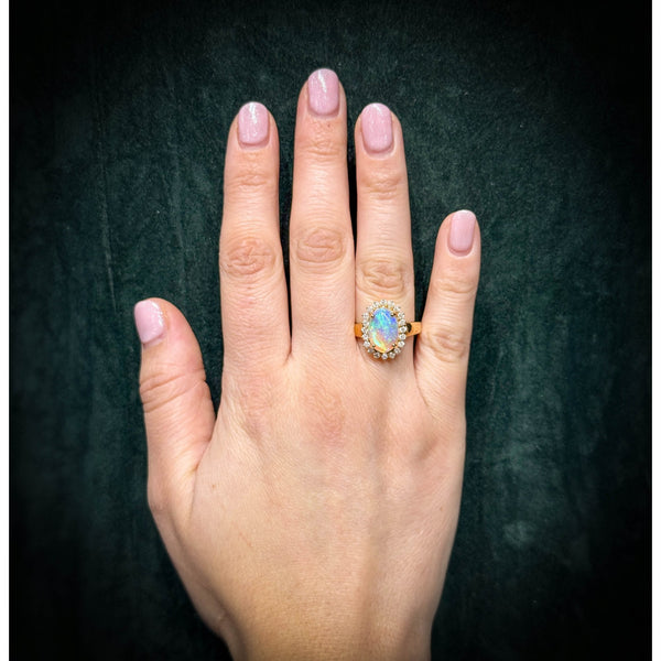 18ct rose gold 1.78ct natural opal & 0.47ct diamond ring