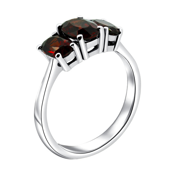 Platinum 7x5mm & 6x4mm garnet 3 stone ring