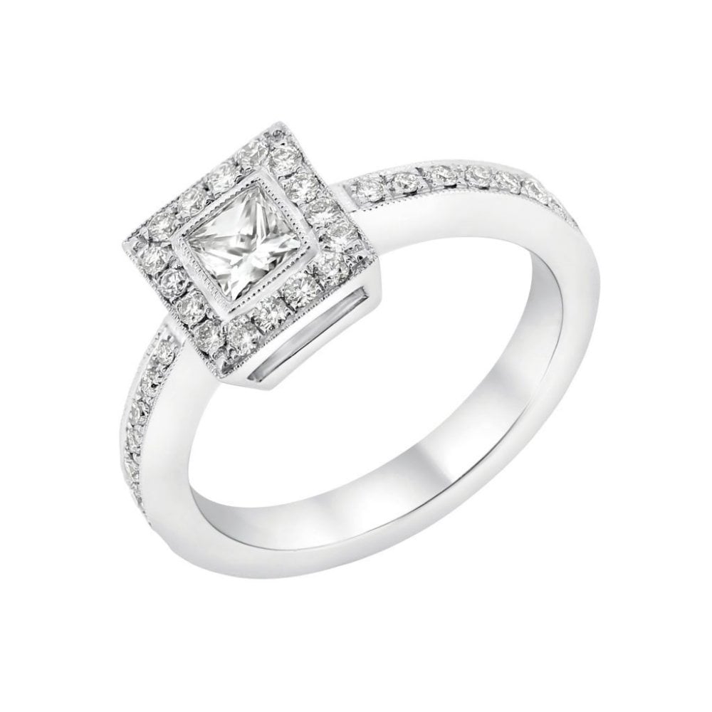 Platinum 0.52ct princess & 0.24ct round diamond halo ring