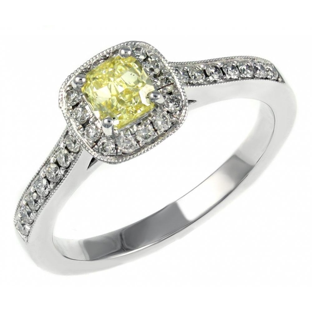 Platinum 0.51ct fancy yellow VVS2 GIA diamond halo ring