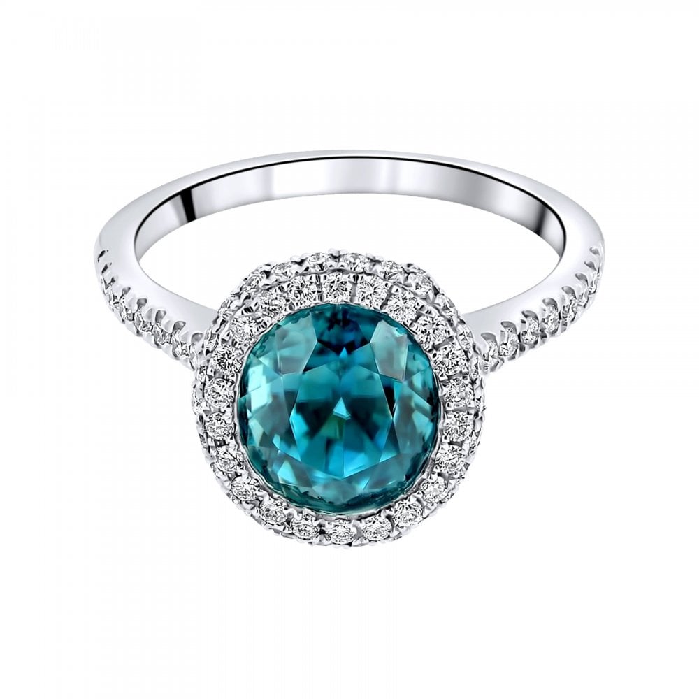 18ct white gold 4.29ct blue zircon & 0.66ct diamond halo ring