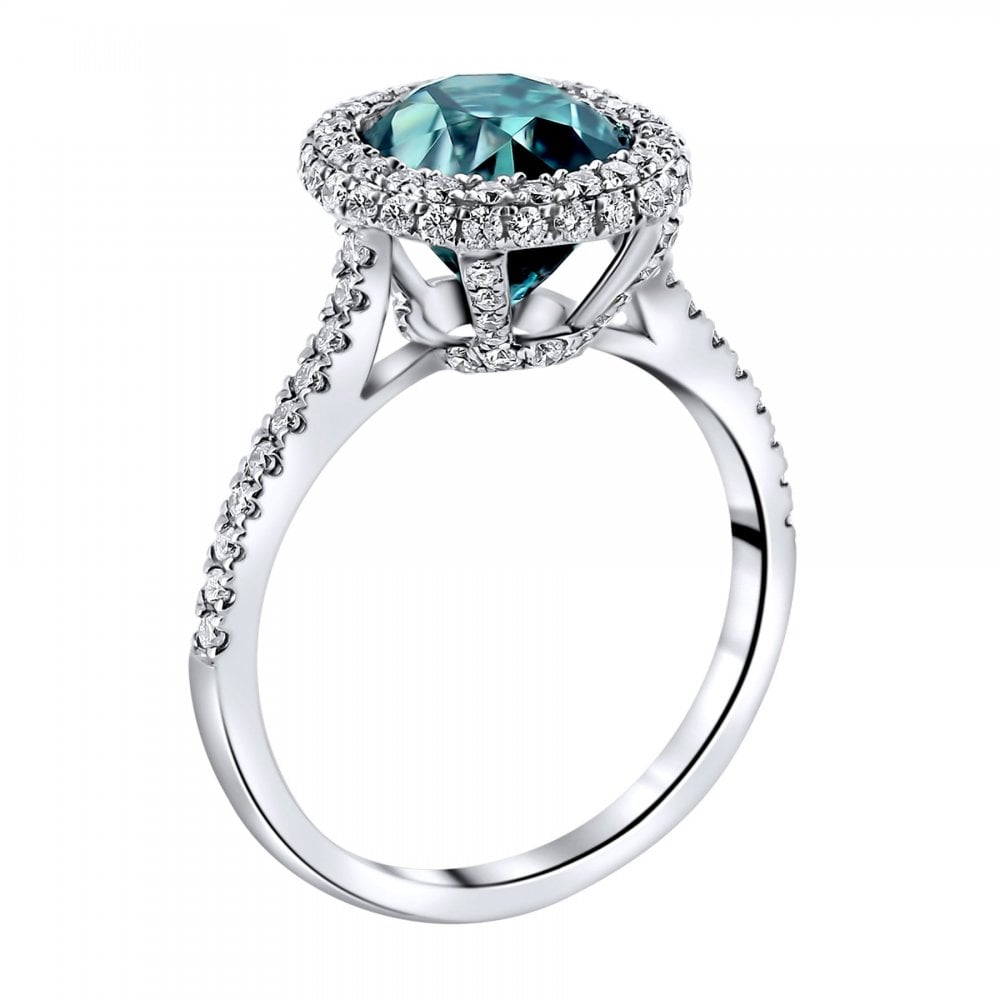 18ct white gold 4.29ct blue zircon & 0.66ct diamond halo ring